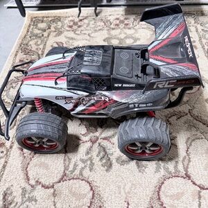 New Bright RC Pro Stinger Black and Red Toy Car